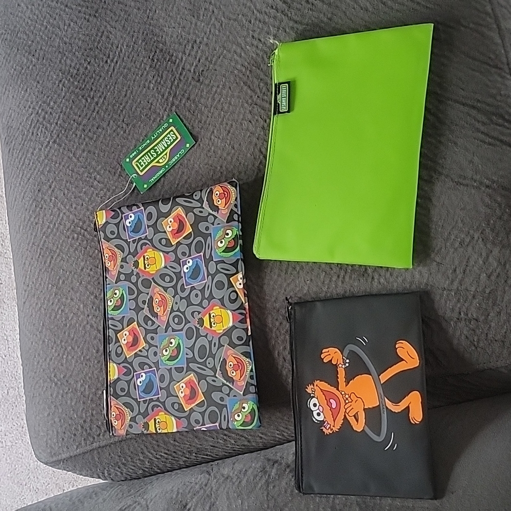3 Sesame street zip vinyl bags